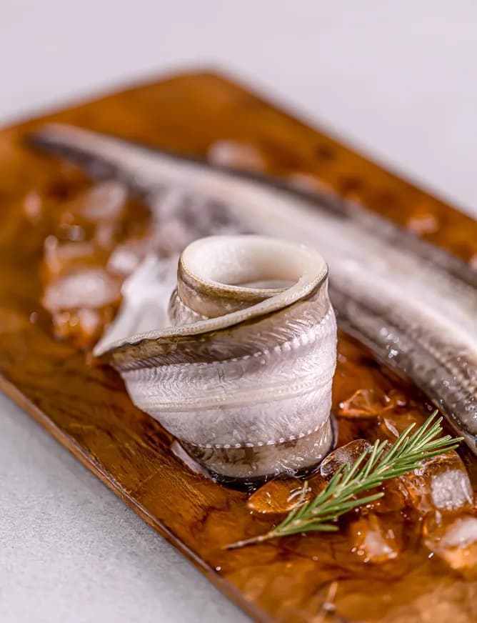 Eel served on a wooden board
